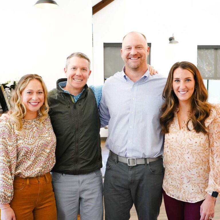 Palmetto Family Orthodontics orthodontist posing for a group photo in the orthodontic office